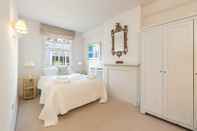 ห้องนอน Altido Elegant 2-Bed Mews Flat Near Buckingham Palace