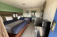 Bedroom Executive Inn & Suites