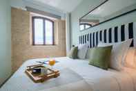 Phòng ngủ Sercotel Sevilla Guadalquivir Suites