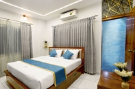 Bedroom Royal Tusker Luxury Service Apartments