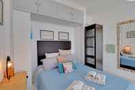 ห้องนอน Faro Airport Flat 1 by Homing