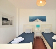 Bedroom 6 Prainha Algarve Villa With Pool by Homing