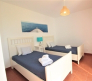 Bedroom 7 Prainha Algarve Villa With Pool by Homing