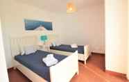 Bedroom 7 Prainha Algarve Villa With Pool by Homing