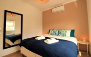 Bedroom 3 Quarteira Design by Homing