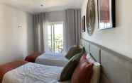 Bedroom 7 Albufeira Deluxe Residence With Pool by Homing