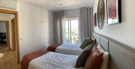 Bedroom 4 Albufeira Deluxe Residence With Pool by Homing