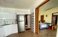 ห้องนอน 5 Absolute Beachfront Resort