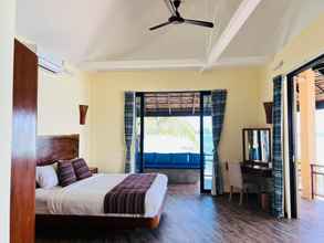 ห้องนอน 4 Absolute Beachfront Resort