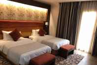 Kamar Tidur Golden Tulip Hotel Alexandre