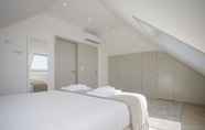Bedroom 7 Liiiving - Luxury Beachfront Apartment V