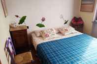 ห้องนอน Cosy apt Close to Sacra di San Michele and Lakes