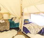 Bedroom 5 8-bed Lotus Belle Mahal Tent in The Wye Valley