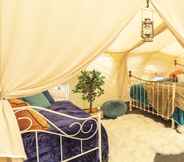 Bedroom 4 8-bed Lotus Belle Mahal Tent in The Wye Valley