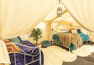 Bedroom 4 8-bed Lotus Belle Mahal Tent in The Wye Valley