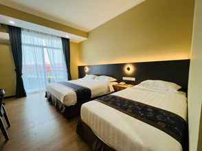 Kamar Tidur 4 Wing Tat Grand Hotel