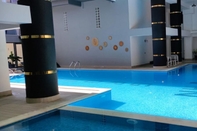 Kolam Renang Flat With Shared Pool and Balcony in Dalaman