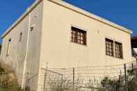 Exterior Traditional Cottage in Andros Cyclades Greece