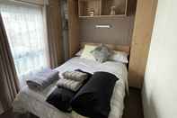 Bedroom Impeccable 4-bed Caravan in Clacton-on-sea