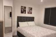 Bedroom Charming 4-bed House in Enfield North London