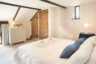 Kamar Tidur Host Stay Tregaer Mill Barn