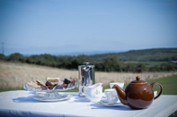 Restaurant Three Cliffs Glamping Tent - Llangennith