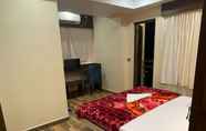 Bilik Tidur 3 Hotel Signature Inn New Digha