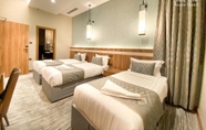 Bilik Tidur 7 Roots Hotel