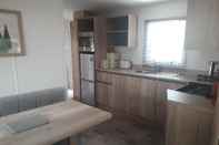 Kamar Tidur Immaculate 2-bed Static Caravan in Carlisle