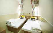 Kamar Tidur 4 Kong Hing Guest House