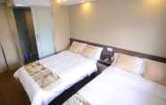 Kamar Tidur 6 Kong Hing Guest House