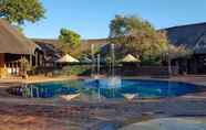Hồ bơi 2 Golden Leopard Resorts - Manyane Resort