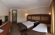 Bedroom 6 Club Munamar Beach Resort – All Inclusive