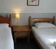 Phòng ngủ 5 Oak Farm Hotel