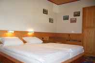 Kamar Tidur Smile Hotel