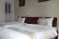 Kamar Tidur The Flora Boutique Hotel