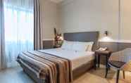 Kamar Tidur 3 Fragrance Hotel St. Peter