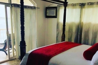 Phòng ngủ Bocas Paradise Hotel