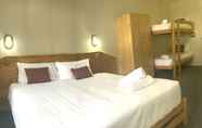 ห้องนอน 3 Ski Rider Hotel