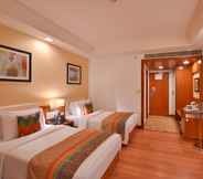 Bedroom 3 Fortune Park Orange- Member ITC Hotel Group