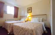 Bedroom 6 Sand Castle Suites Motel