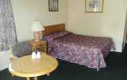 ห้องนอน 4 Oasis Motel