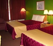 ห้องนอน 6 Columbus Inn & Suites
