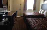Phòng ngủ 3 America Inn & Suites