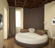 Bedroom 7 Arenula Suites