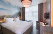 Bedroom 7 Ramada by Wyndham The Hague Scheveningen