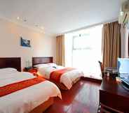 Bedroom 5 Greentree Inn Business Hotel