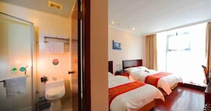 Kamar Tidur Greentree Inn Business Hotel