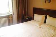 ห้องนอน GreenTree Inn Harbin City Central Avenue Hotel