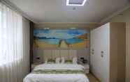 Kamar Tidur 3 Golden Phoenix Hotel